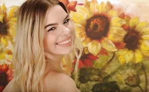 18 year old girl Katie Lewis stands naked after undressing in her bedroom